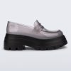 Side view of a transparent smoke Royal High + Undercover platform loafer with black sole.