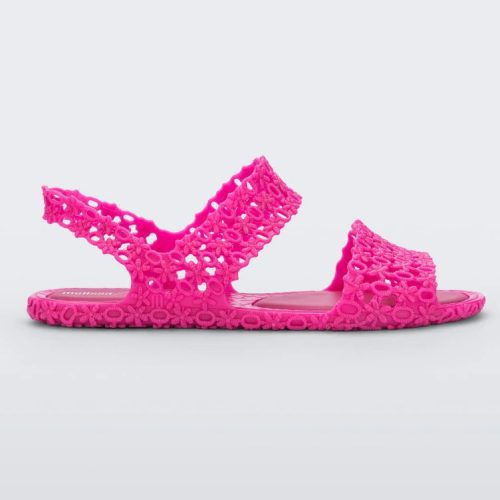 Side view of a pink Melissa Panc Sandal with a crochet pattern.