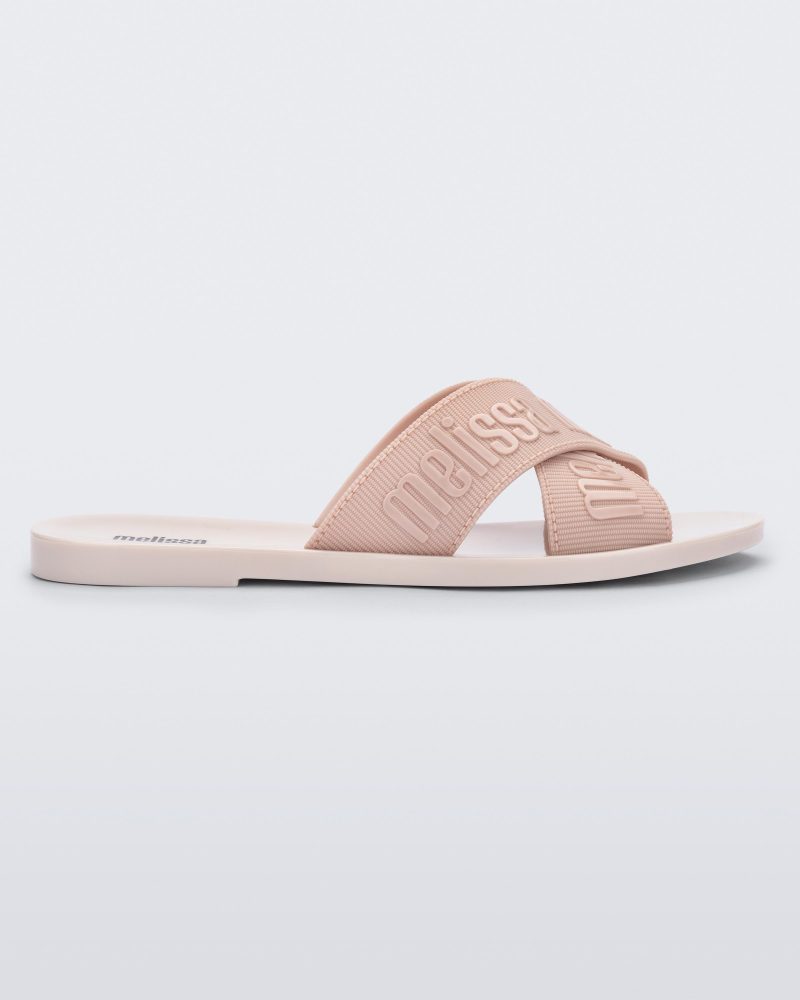 Side view of a beige M Lover adult slide