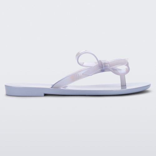 Side view of a Lilac/Blue Pearl Mini Melissa Harmonic Sweet flip flop.