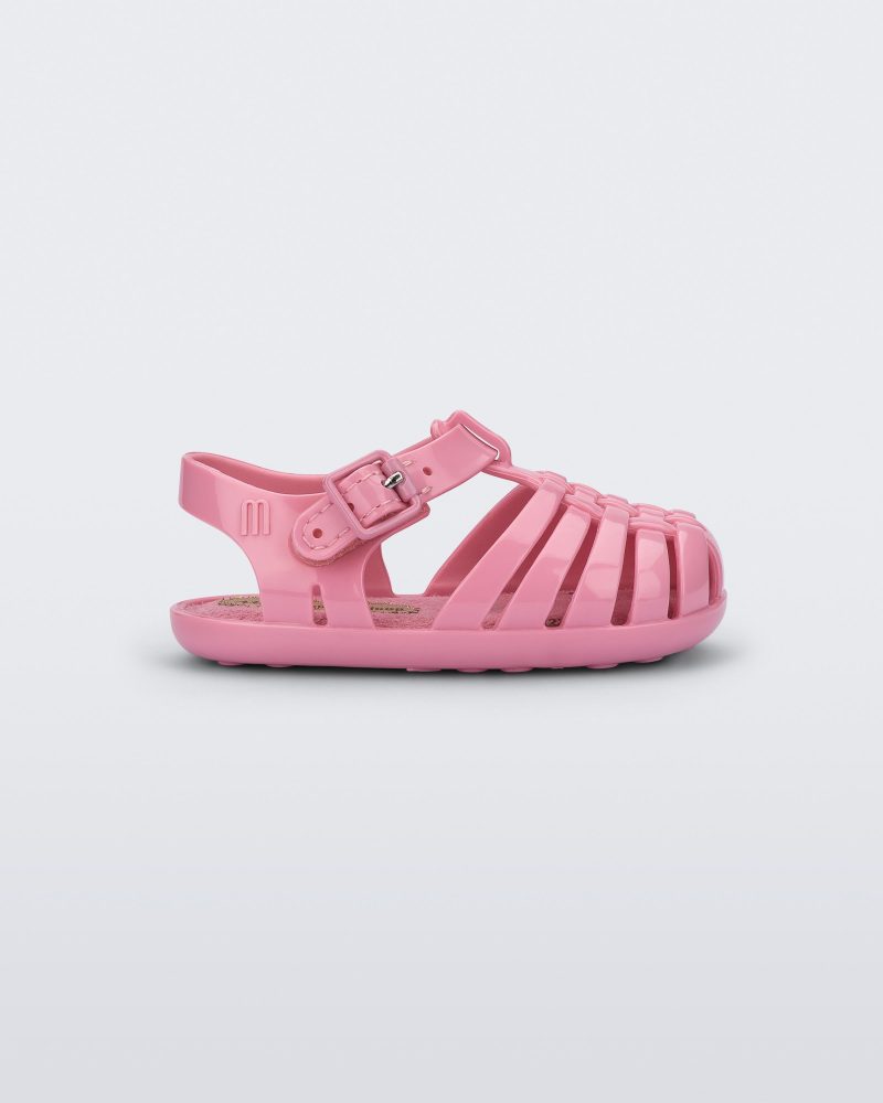 Side view of a pink baby My First Mini Melissa Possession sandal