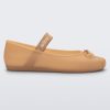 Side view of a Melissa Sophie ballet flat in beige with M-logo strap and bow applique