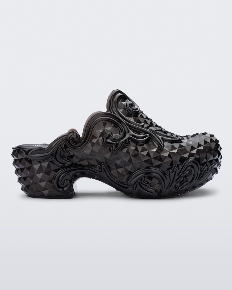 Side view of a black Court Clog + Y/Project platform clog