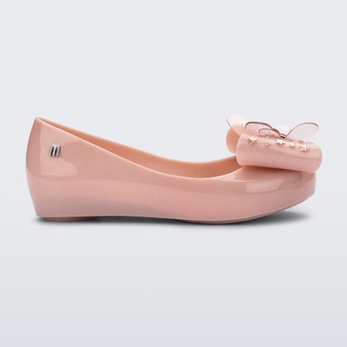 Side view of a Mini Melissa Ultragirl peeptoe ballet flat in pink with star printed butterfly bow applique.