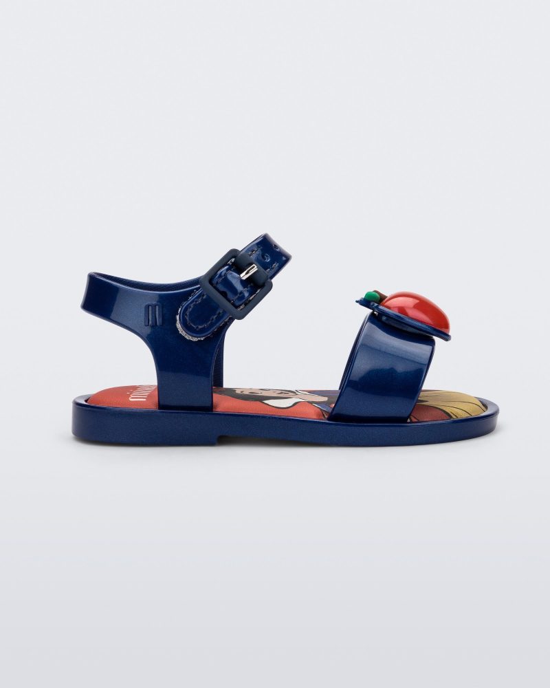 Side view of a metallic blue Mini Melissa Mar Sandal Princess sandal with an apple detail on the front strap, an ankle strap and Princess Snow White soul