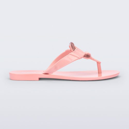 Side view of a pink Olivia adult flip flop