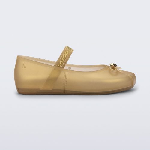 Side view of a pearly beige Sophie kids ballerina flat with bow