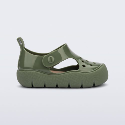 Side view of a green Bowie baby sandal.