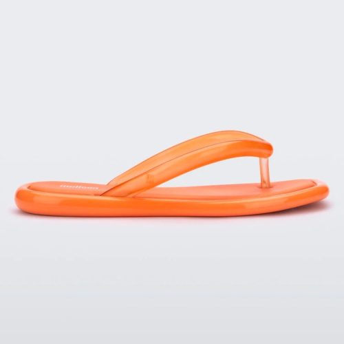 Side view of orange Melissa Airbubble Flip Flop.