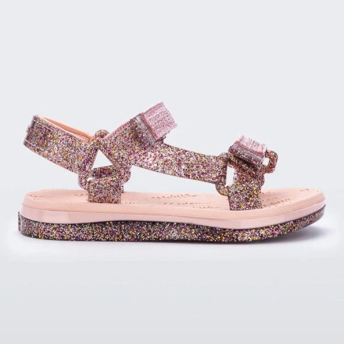 Side view of pink Mini Melissa Papete sandals with glitter straps.