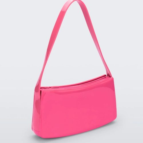 Angled view of pink Melissa Baguete shoulder handbag.