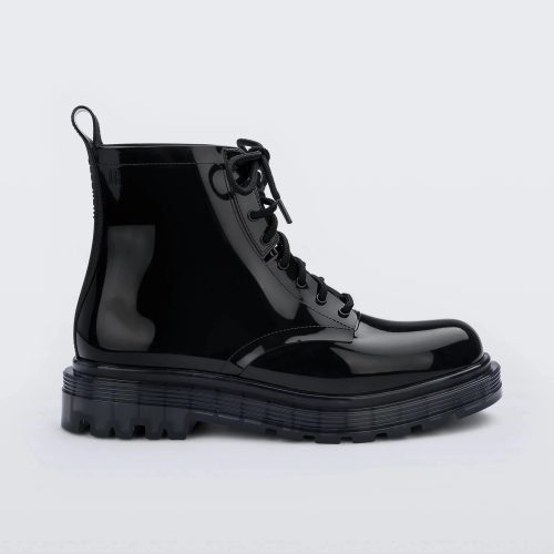 Outer side view of a pair of black Melissa Coturno boot with a black base, laces and sole.