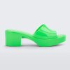 Side view of a Melissa Shape platform slide in Green.