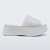 Side view of a white Melissa Becky platform slide.