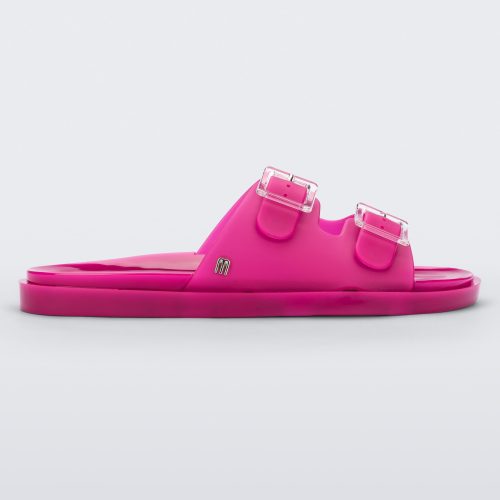 Side view of a dark pink Melissa Wide Slide with two straps fastened at the top with two clear buckles.