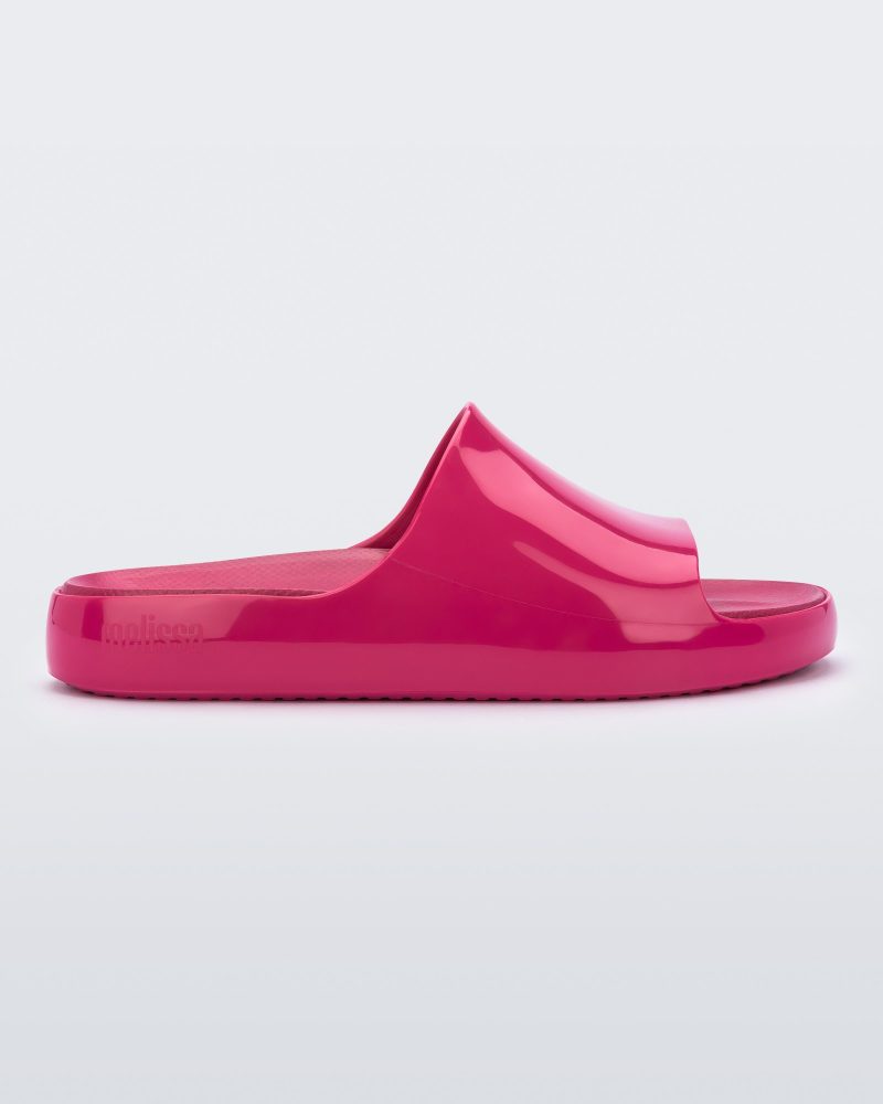 Side view of a pink Melissa Cloud slide.