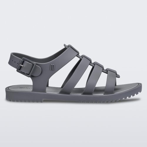 Side view of a dark gray Melissa Flox sandal with straps.