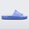 Side view of a transparent blue Melissa Cloud slides.