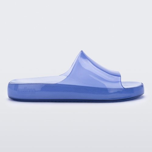 Side view of a transparent blue Melissa Cloud slides.