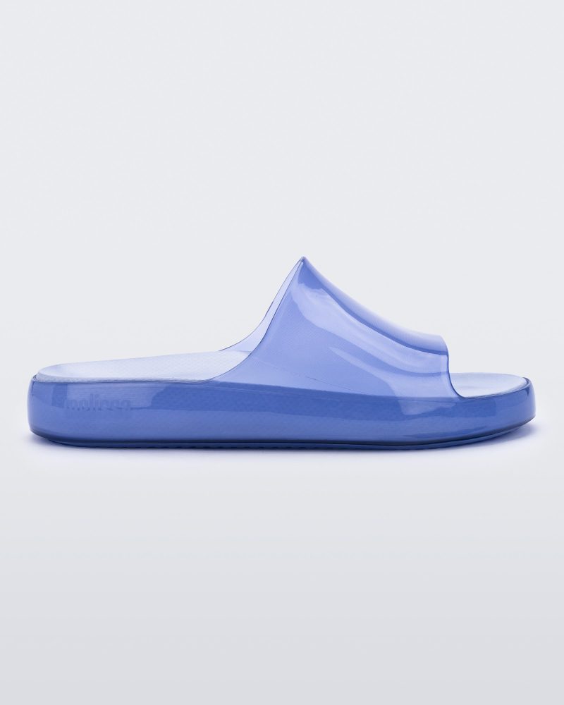 Side view of a transparent blue Melissa Cloud slides.