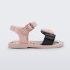 Side view of a pink and black Minnie Mouse Mini Melissa Mar Sandal with a pink bow.