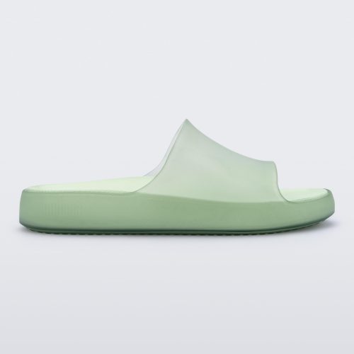 Side view of a transparent green Melissa Cloud slide.